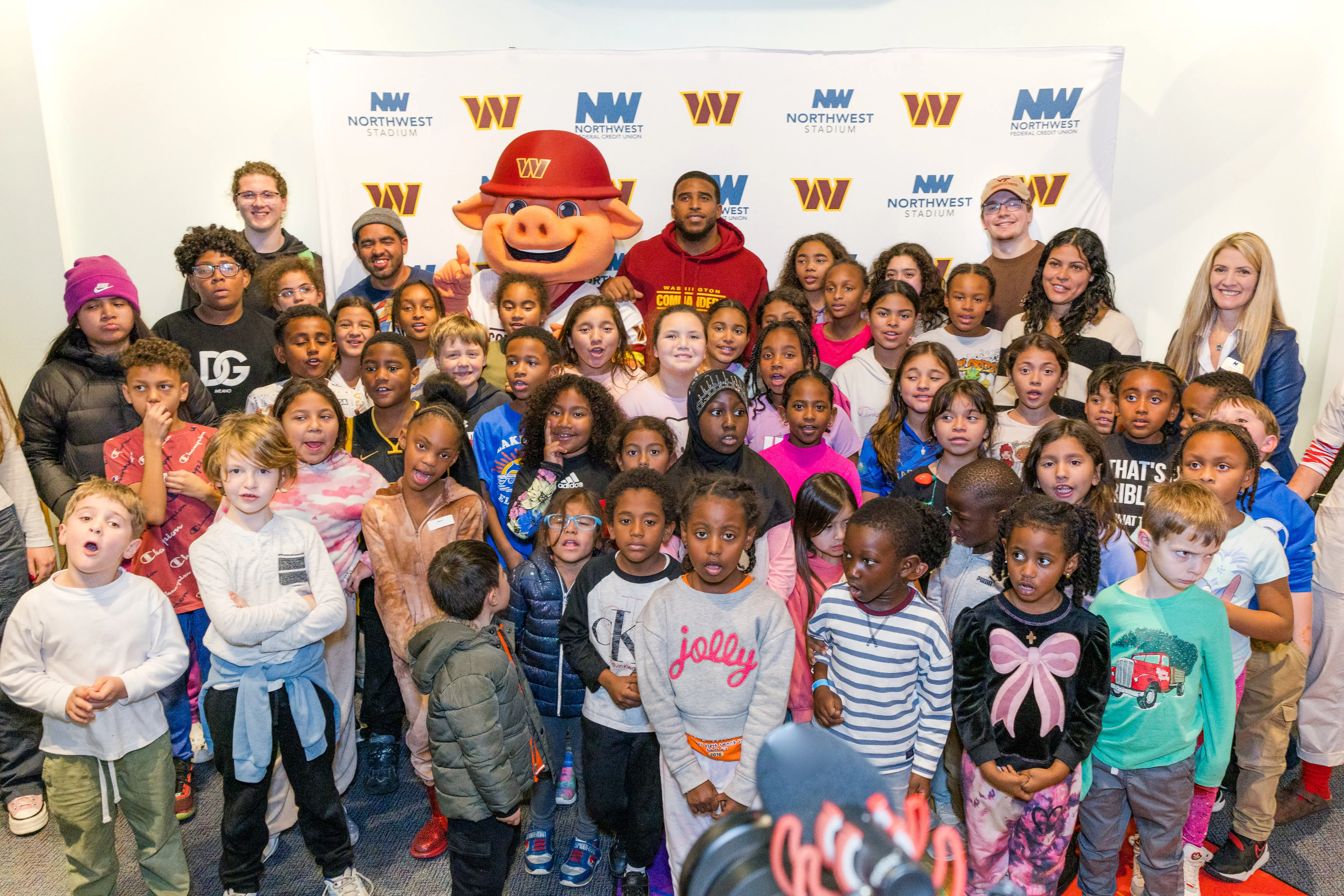 Children with the Commanders' mascot