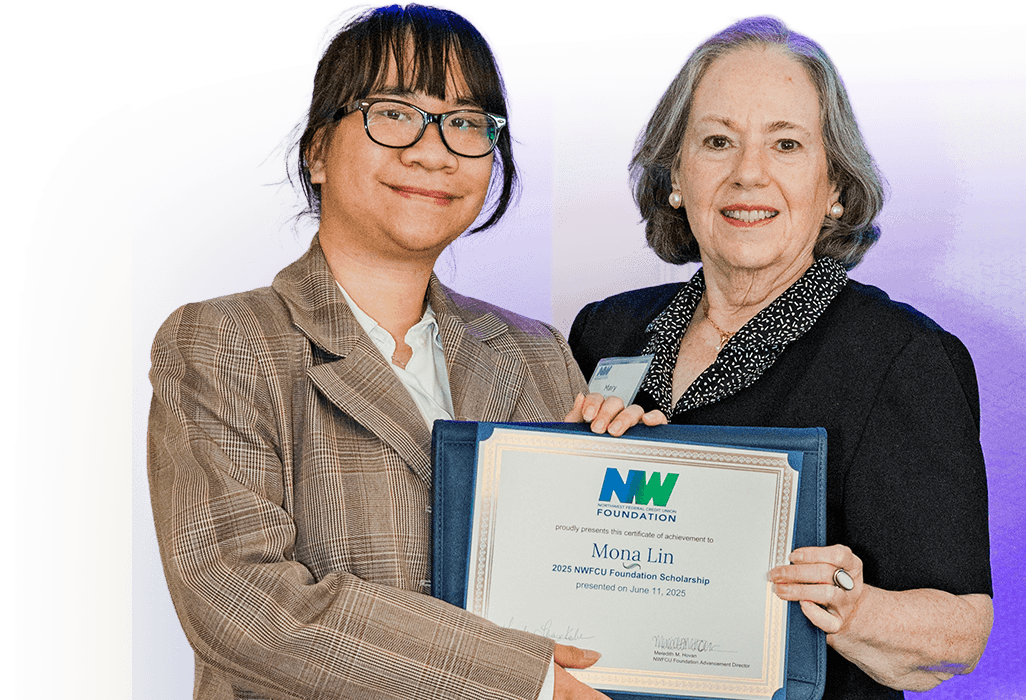 Student receiving the NWFCU Foundation scholarship award at a ceremony